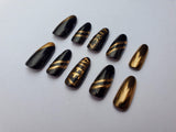 Black and Gold Ateez Nails
